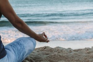 meditating at the beach